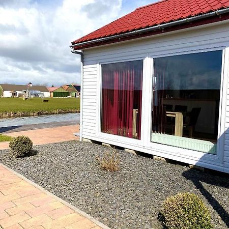 Ferienpark Vislust Modernes Holzhaus Am Ijsselmeer Mit Eigenen Steg Villa Wervershoof Exterior photo